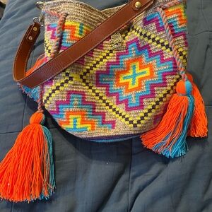 Vibrant Geometric Hobo Bag with Tassels